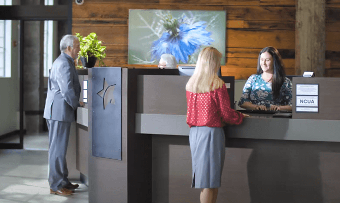 Teller speaking to member at Freedom First's downtown Roanoke branch