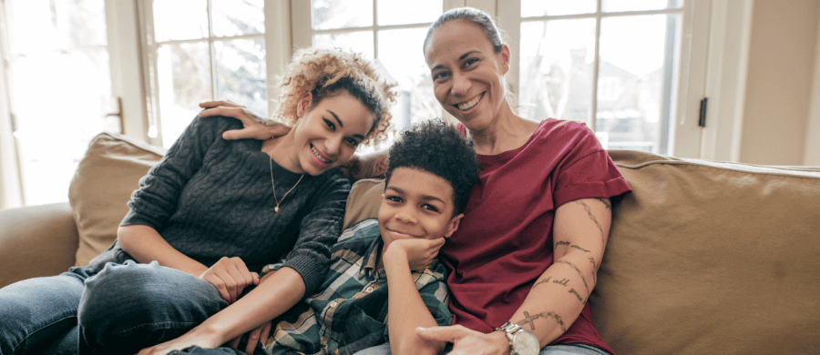 Tattooed woman with teenage children