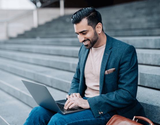 Young professional man using a laptop