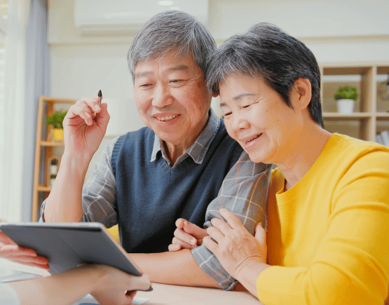 Older couple looking at tablet together