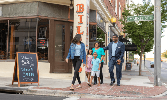 Family of four walking out of local Roanoke restaurant Billy's