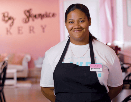 Shaneice Jones posing in her store Sweets by Shaneice