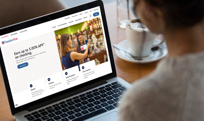 woman browsing Freedom First site on her laptop