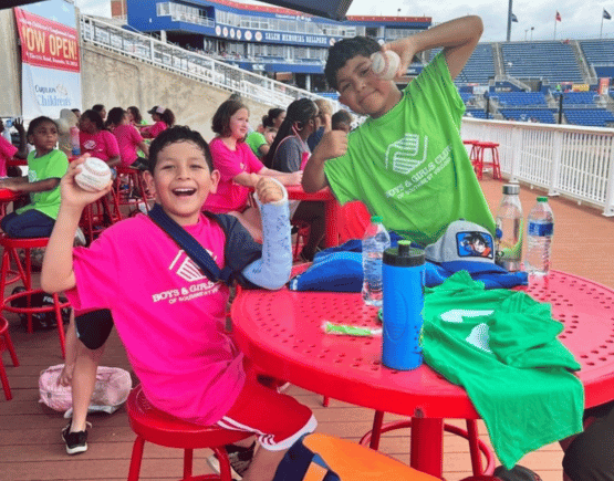Summer camp participants at a Salem Red Sox game
